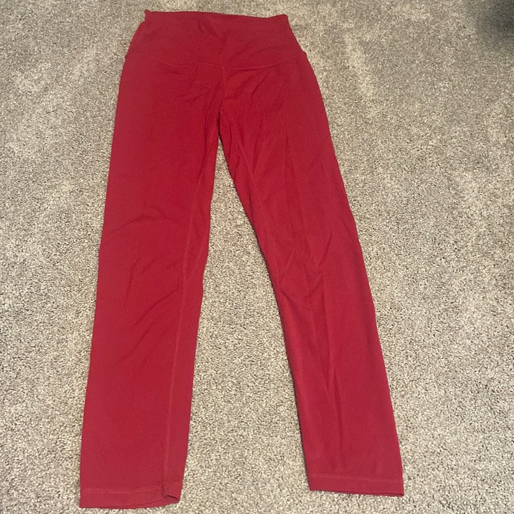 Cranberry colored leggings from Born Primitive.